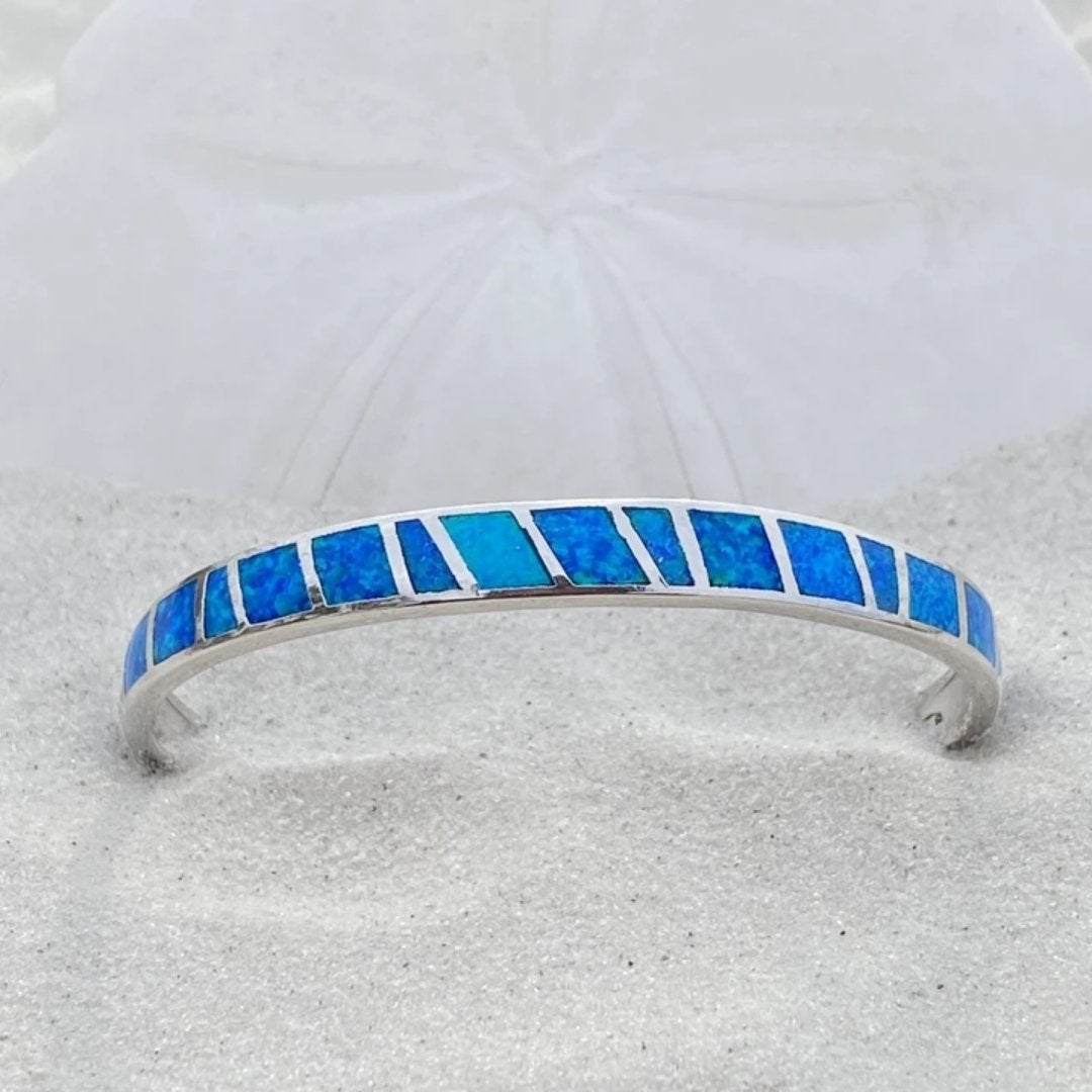 Silver bracelet with blue opal stone