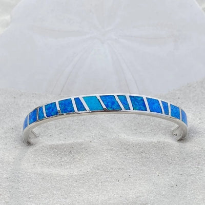 Silver bracelet with blue opal stone
