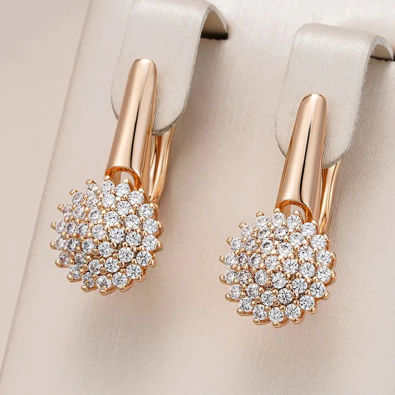 Elegant zirconium flower earrings in gold